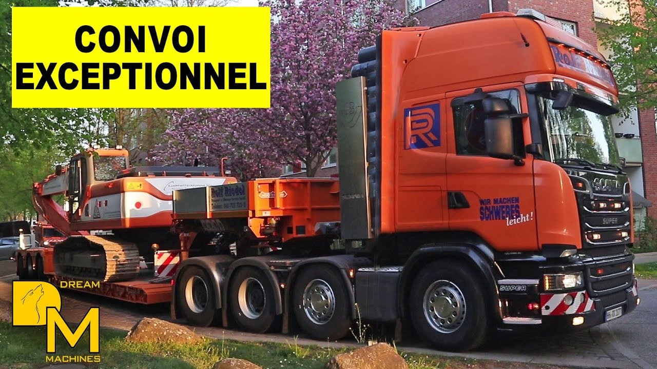 SCANIA V8 SCHWERTRANSPORT 8x4 DOOSAN LONG REACH BAGGER ZU BAUSTELLE