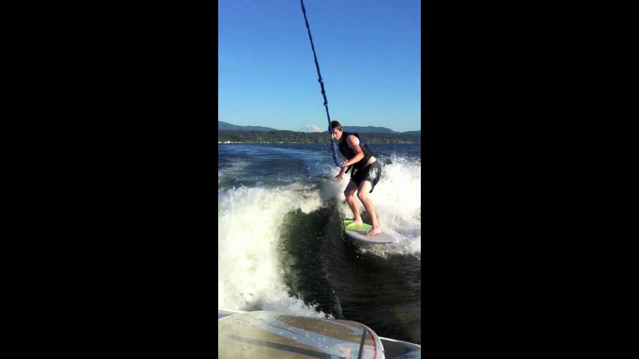Jim Surfing behind Dave's boat