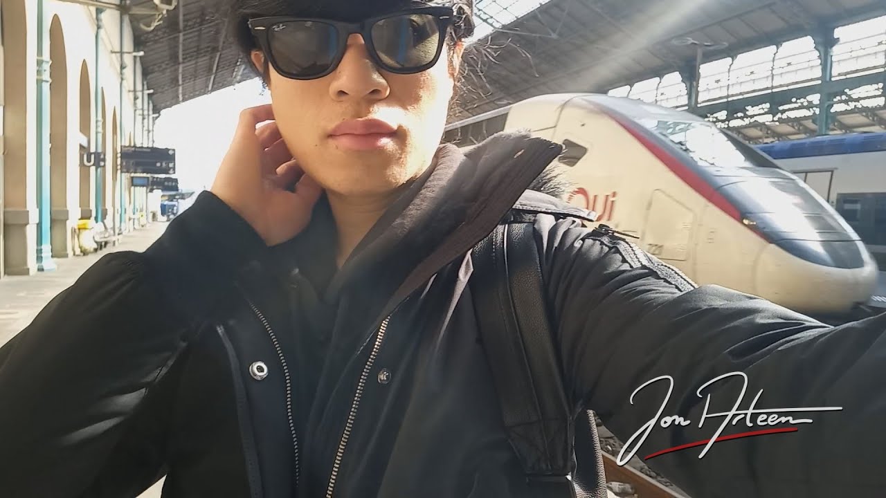 Jon Arteen is at the train station. Where is he going?