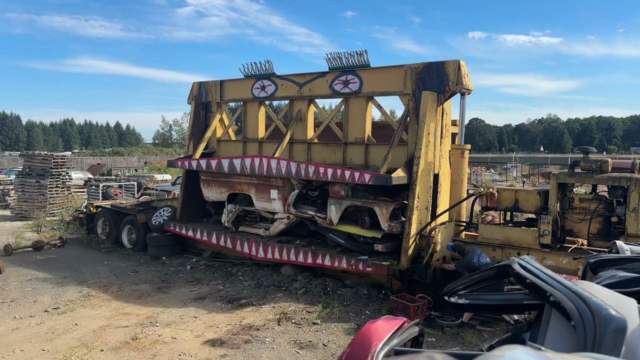 Bertha eating some C10. Car Crusher, crushing cars.