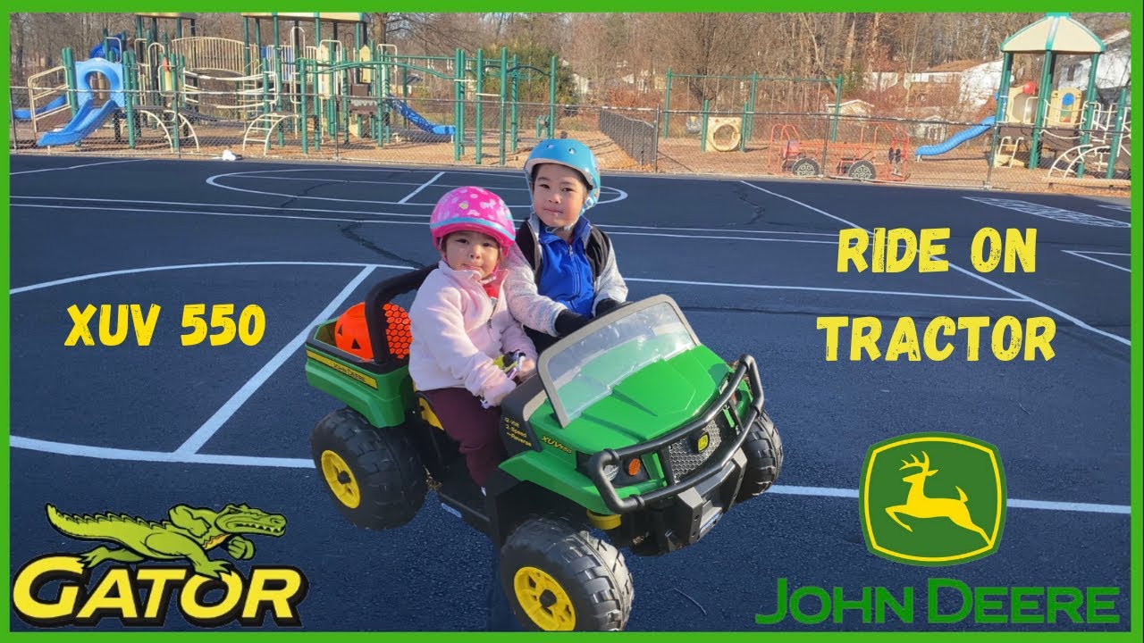 Kids riding John Deere Gator XUV 550 Tractor by Peg Perego | Jayden’s Adventures