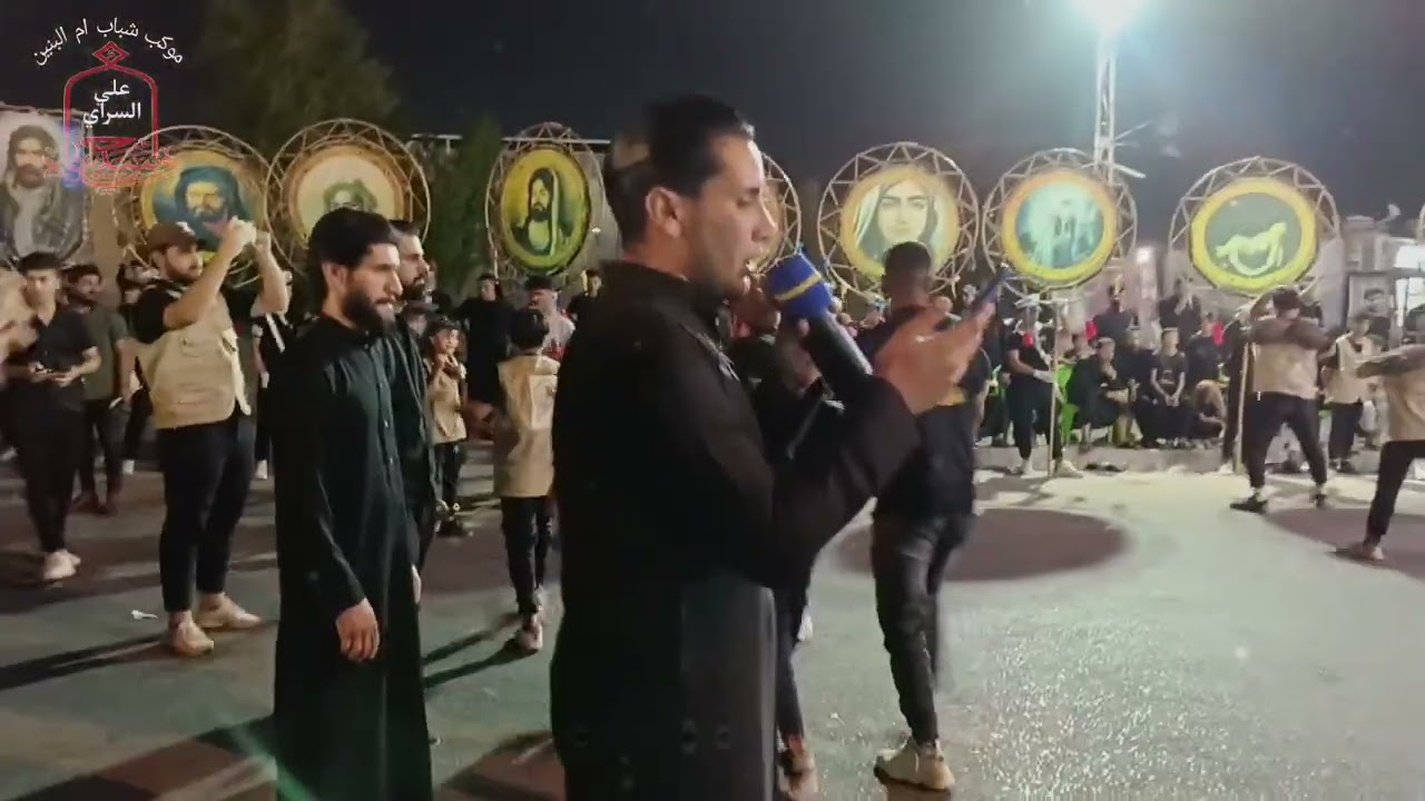 استعراض موكب شباب ام البنين _الهارثه في نواب الضباط_  زينب سبوها(الرادود الحسيني ملا مهدي البكراوي)