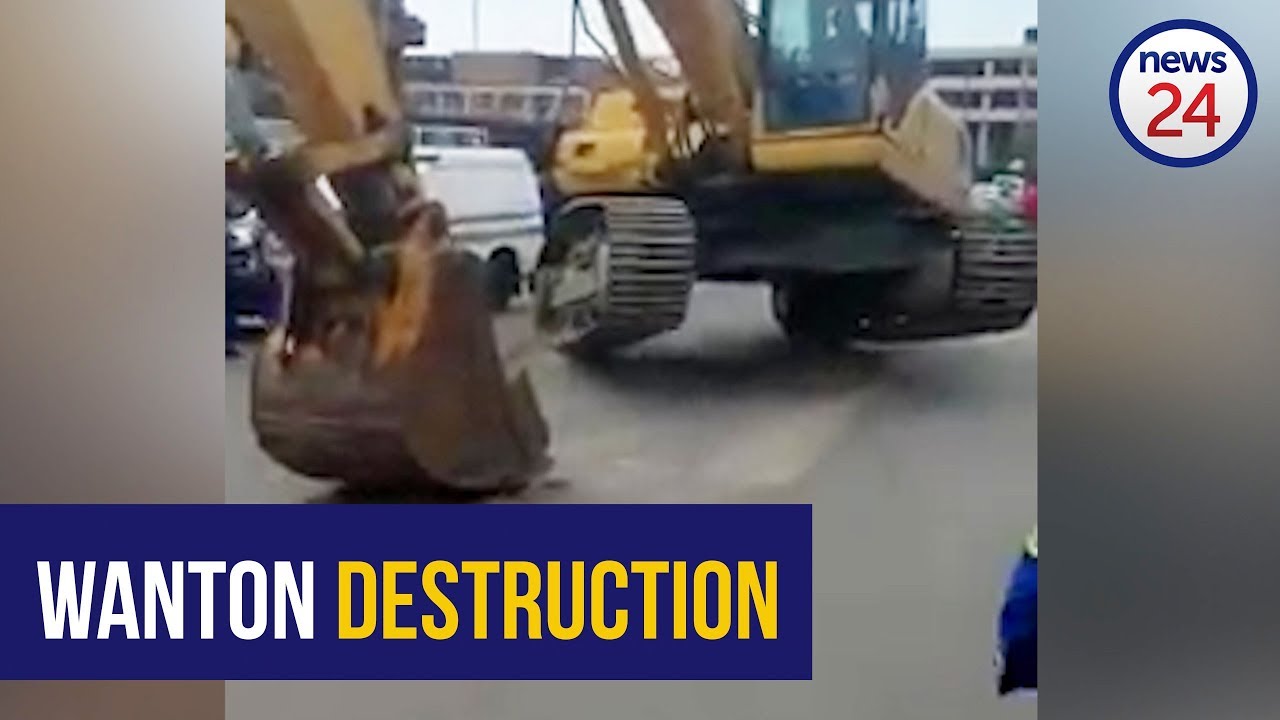 WATCH: Striking municipal workers use heavy plant machinery to damage road