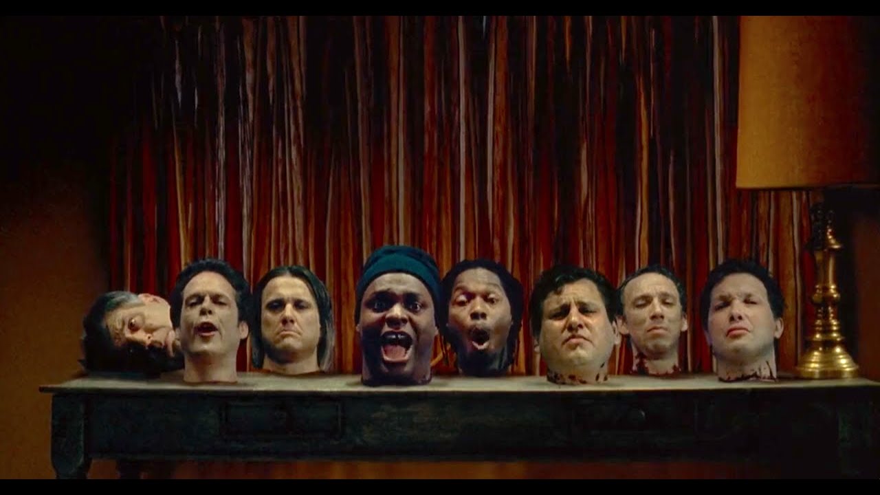 8 Heads in A Duffel Bag 1997 : Singing heads nightmare...