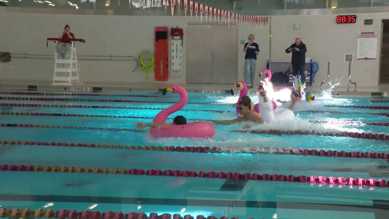 Команда по плаванию Бостонского колледжа привлекает внимание к борьбе с раком.