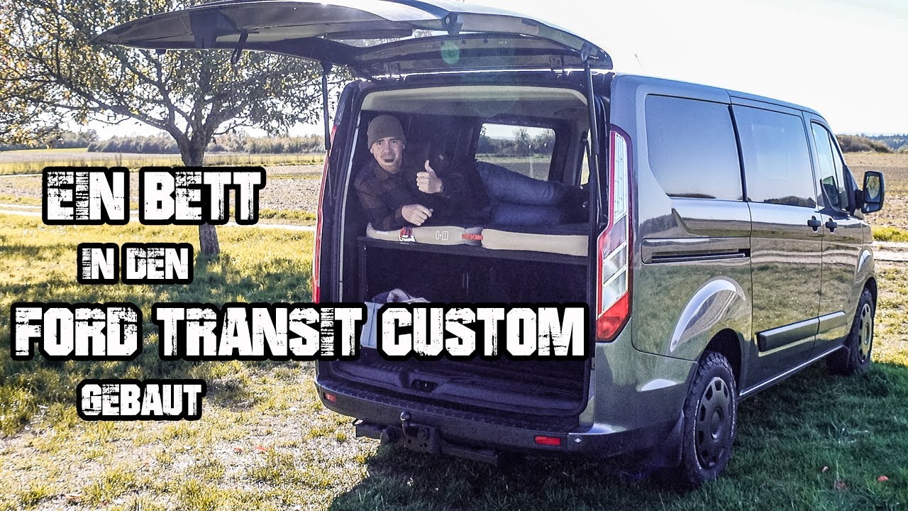 Ein Camper Bett in den Ford Transit Custom eingebaut