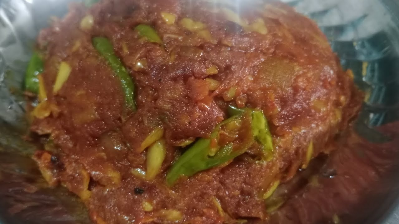টমেটো  দিয়ে রসুন ভর্তার রেসিপি। 