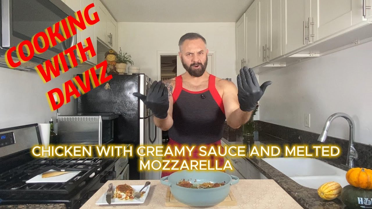 Boneless chicken Thighs_with White Creamy Sauce and Melted Mozzarella Cheese.