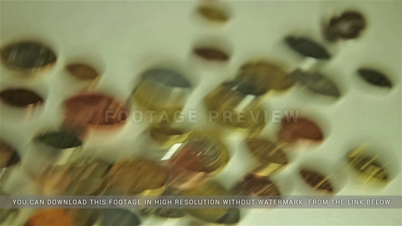 Coins dropping on the table