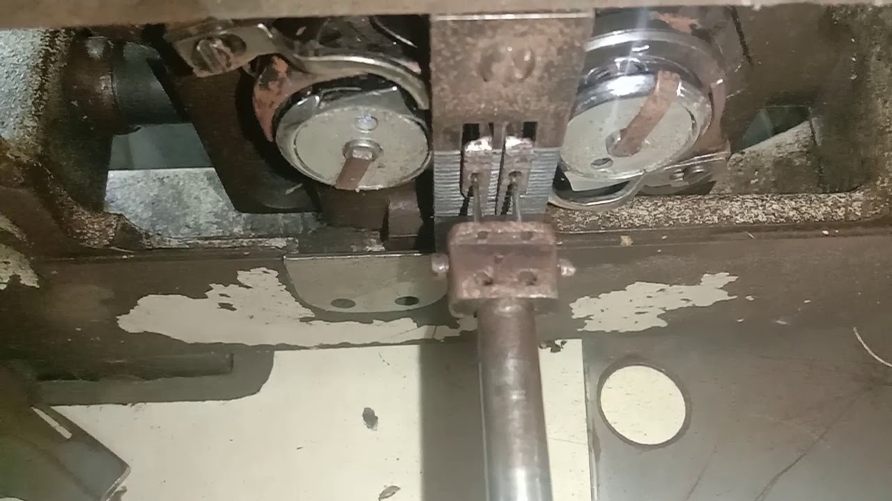 Two needle machine feed dog cam timing.