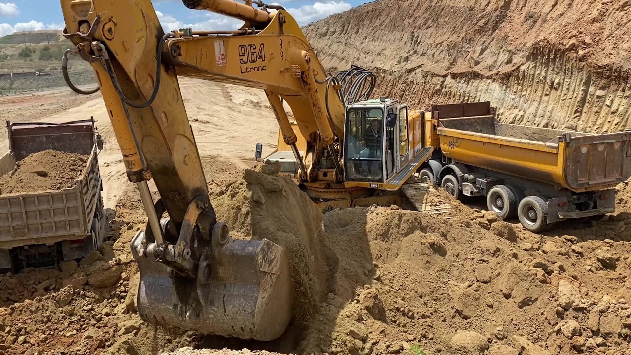 Liebherr 964 Hydraulic Excavator Loading Mercedes & MAN 4 Axle Trucks