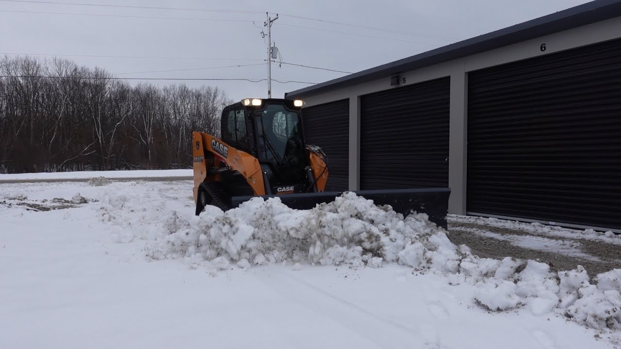 Self Storage snow removal with my new Case Skidsteer Virnig Vplow