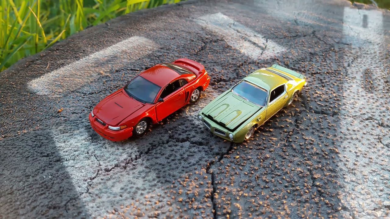 Johnny lightning Mustang y Firebird