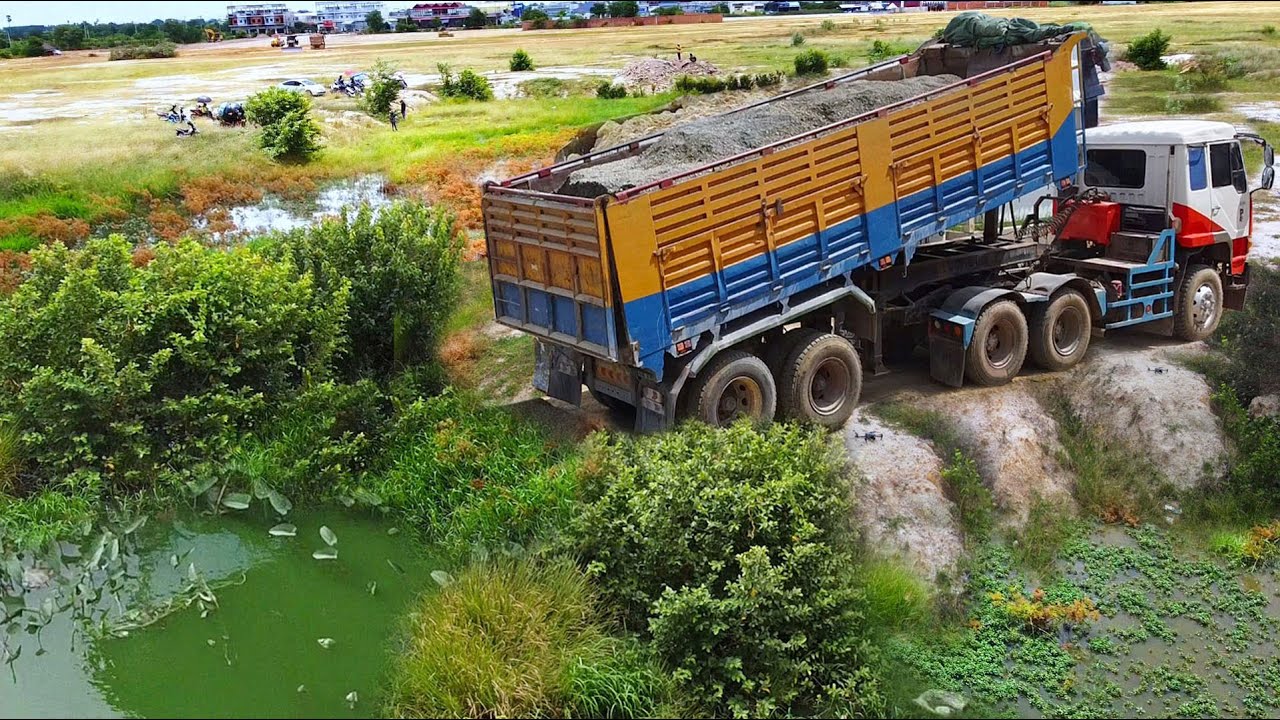 First Start Amazing PROJECT!! Filling Deep Land In Flooded Area Use SHANTUI Bulldozer & 25Ton Truck.