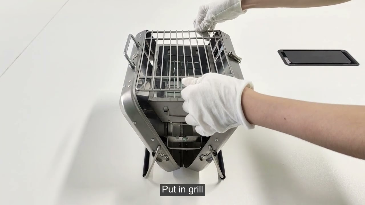 Ultimate Portable BBQ: Suitcase Charcoal Grill with Bold Linear Mesh Design! 🍖