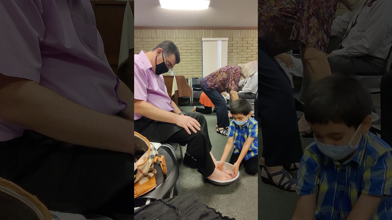 John is washing Daddy's feet
