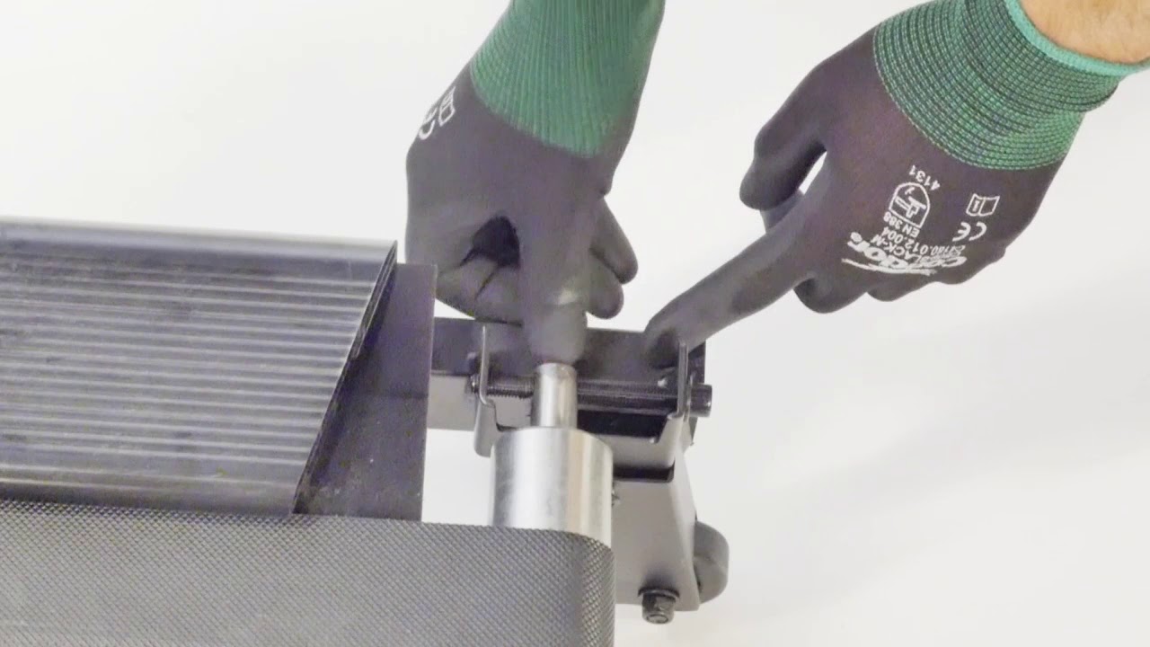 Comment changer le rouleau arrière sur un tapis de course T900A ?