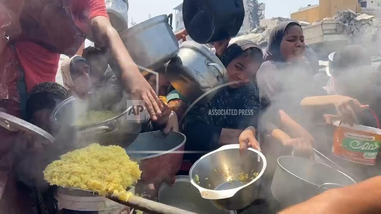 Palestinians gather at charity kitchen in Gaza City amid ongoing food shortages