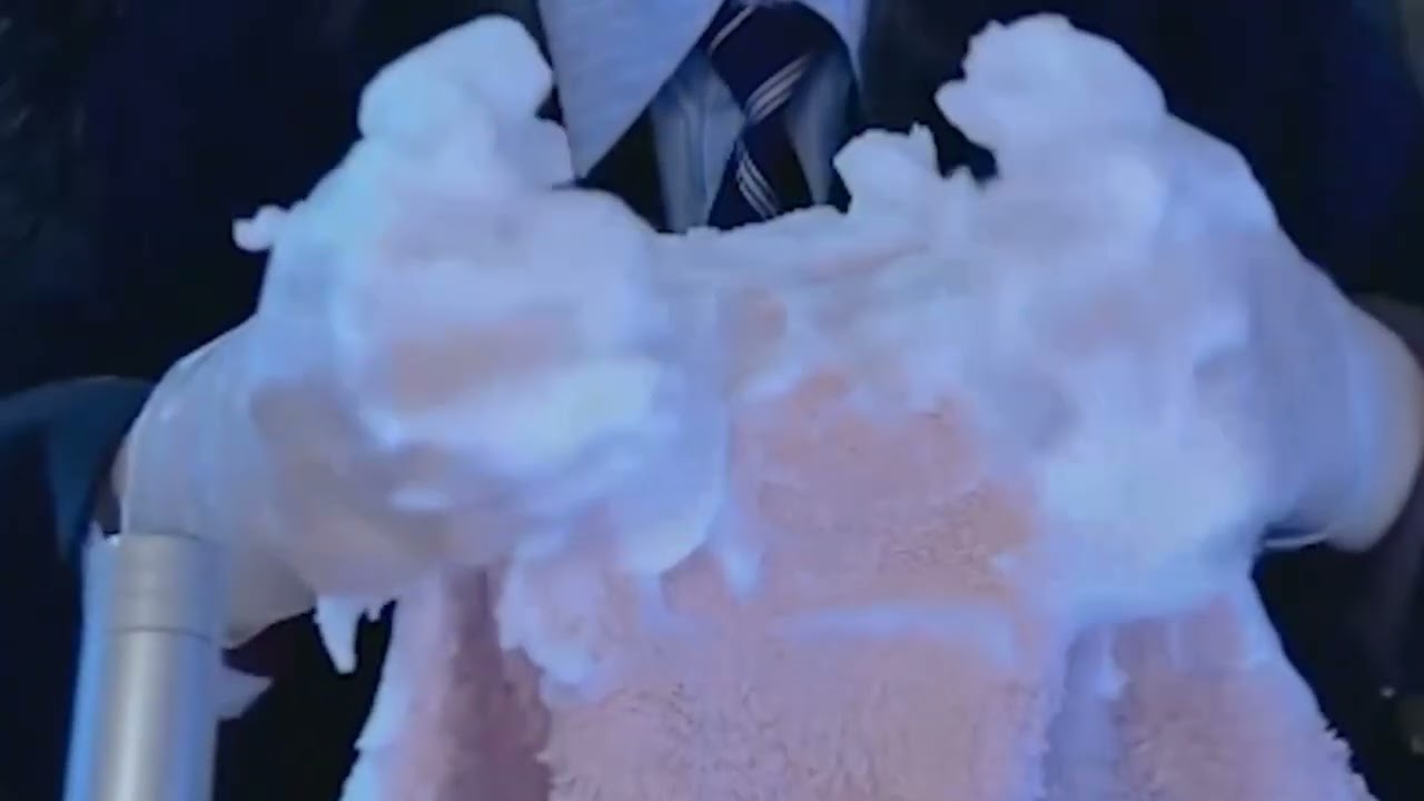 ASMR creating soothing sounds with a towel