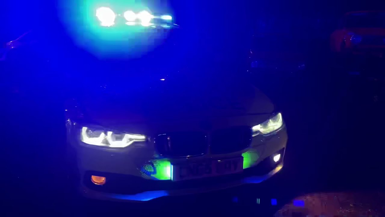 Film vehicle sourcing&rsquo;s police vehicles.  night time walk around blue lights