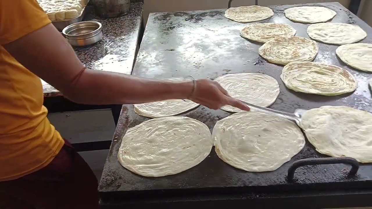Master making malabar porotta 