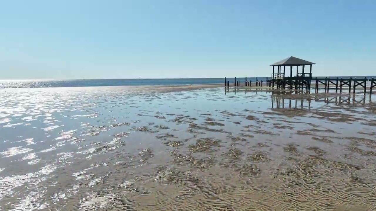 LOW TIDE ON BILOXI BEACH LIGHT HOUSE PIER