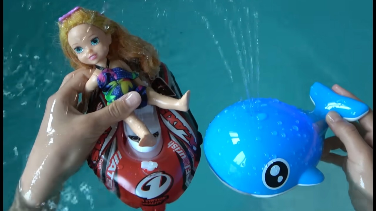 Elsa and Anna toddlers help rescue the magic whale