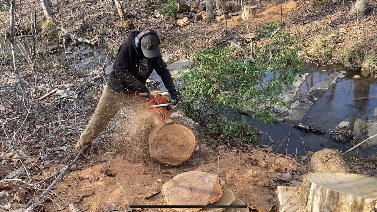 Ported Jon Cutter JC5800 with 18” Bar Burried in Red Oak!!!