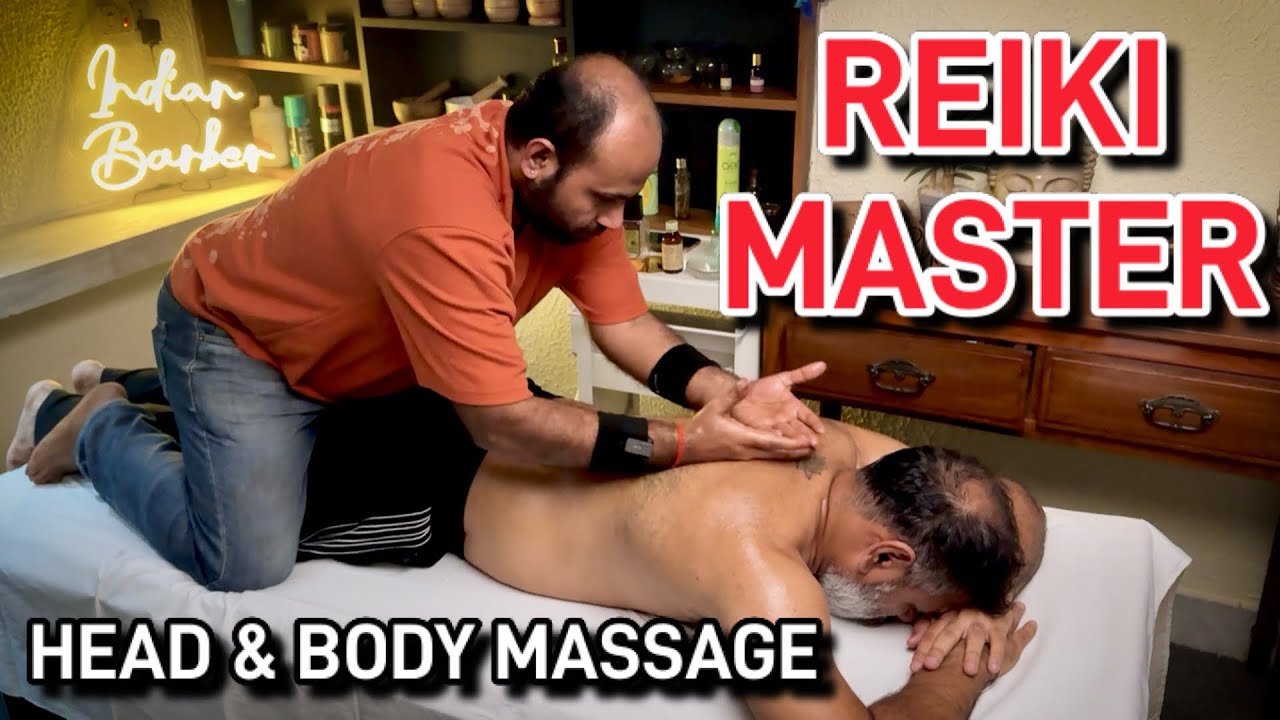 Reiki master performing Head massage, upper body massage to reduce stress n Anxiety , Indian barber,