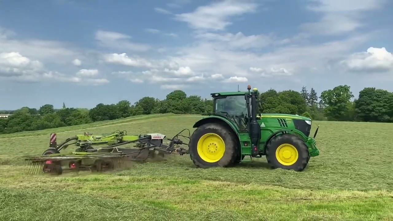 Cumbrian Silage 2024. Rowing ahead of the forager with a John Deere 6195R & Claas Liner rake.
