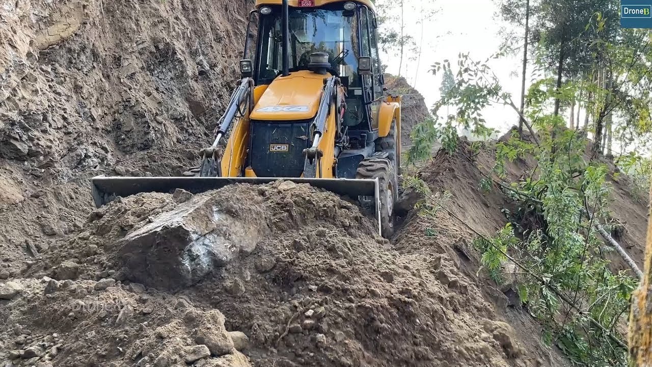 Rural Mountain Villages Connected with New Narrow Road with JCB Backhoe