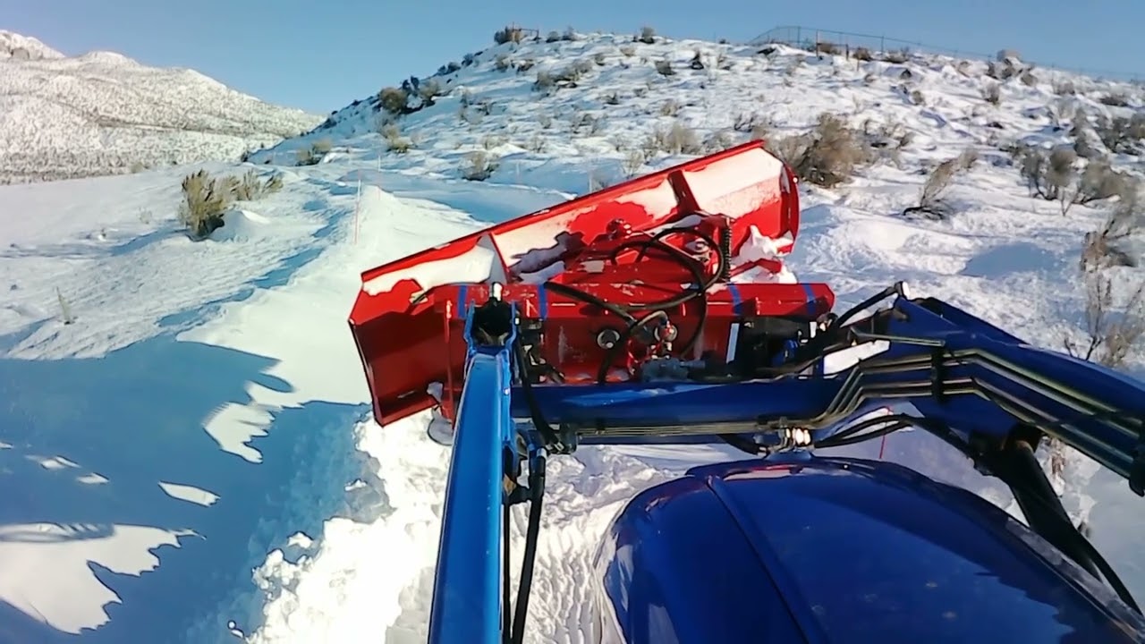 Winter Arrives with a Vengeance Clearing drifts with my Tractor