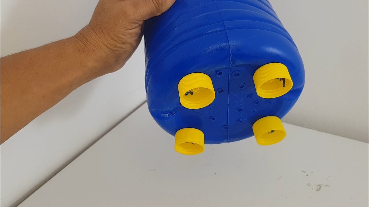 Ideia de vaso com galão, quem gosta de reciclar vai amar e fazer também.