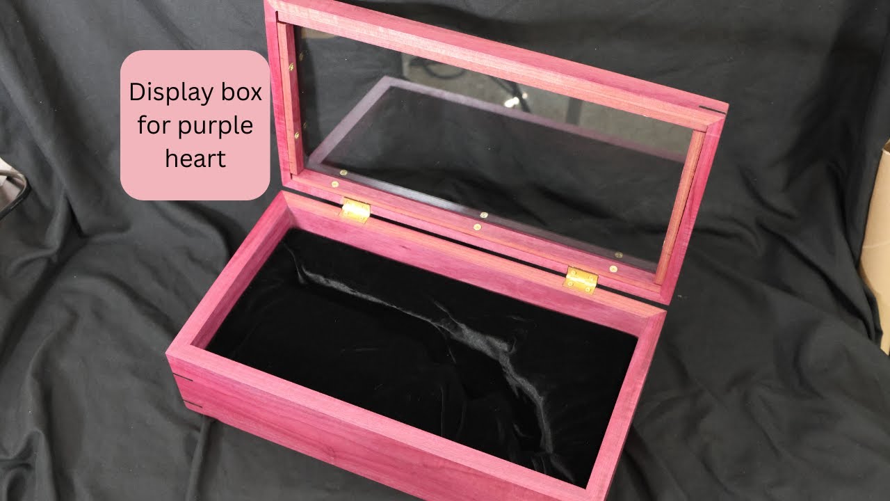 A purple heart display box for a gift