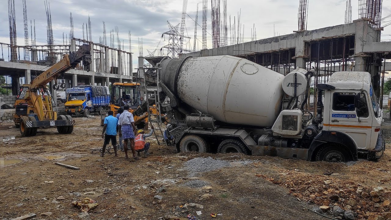 Tata concrete mixer full loaded lorry stuck in mud