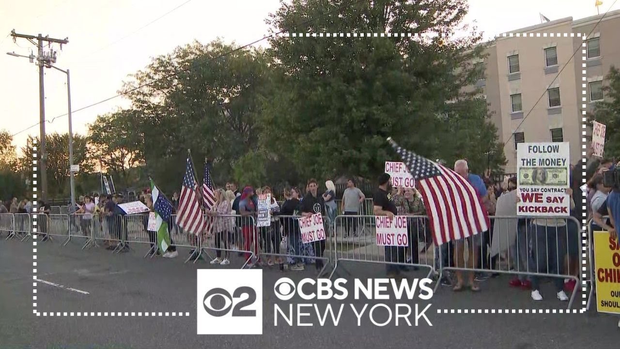 Dozens of protesters gather outside Staten Island asylum seeker shelter