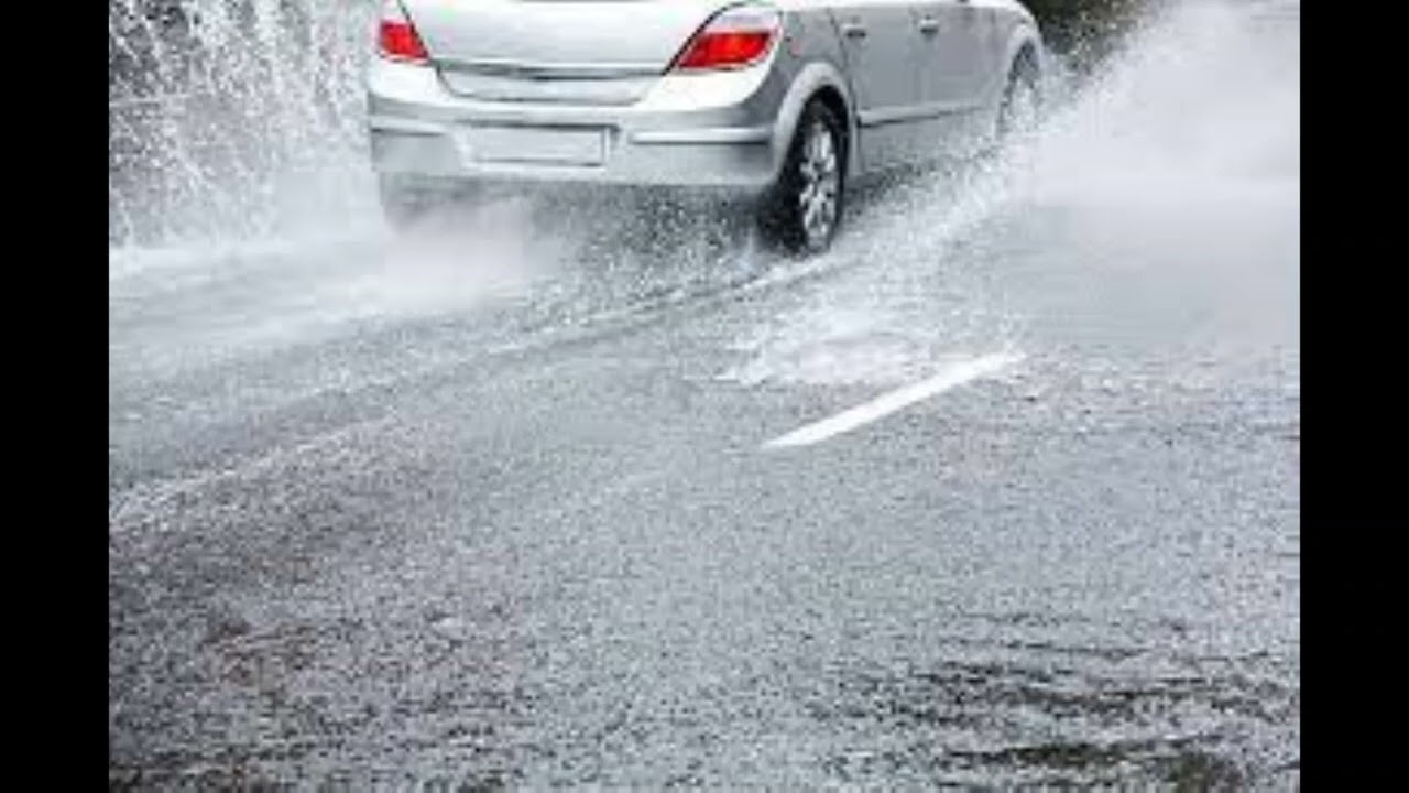 Car driving on a wet road, 100 kph, rain increasing intensity