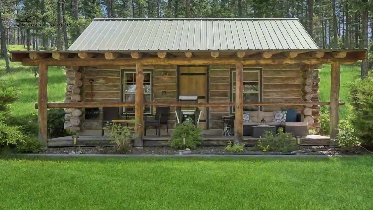 Explore Bigfork, Montana Living on 21 Acres of Adventure with 3 Cabins & a Barn Home!