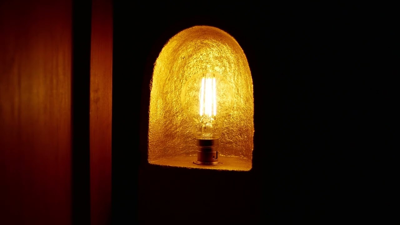 Hand-carved salvaged limestone table lamp with gilded interior