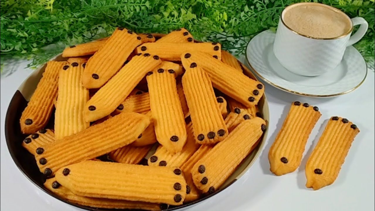 بسكوت جوز الهند بالبرتقال 😋 بدون بيض او سمنة او زبدة هش ودايب ومقرمش 👍
