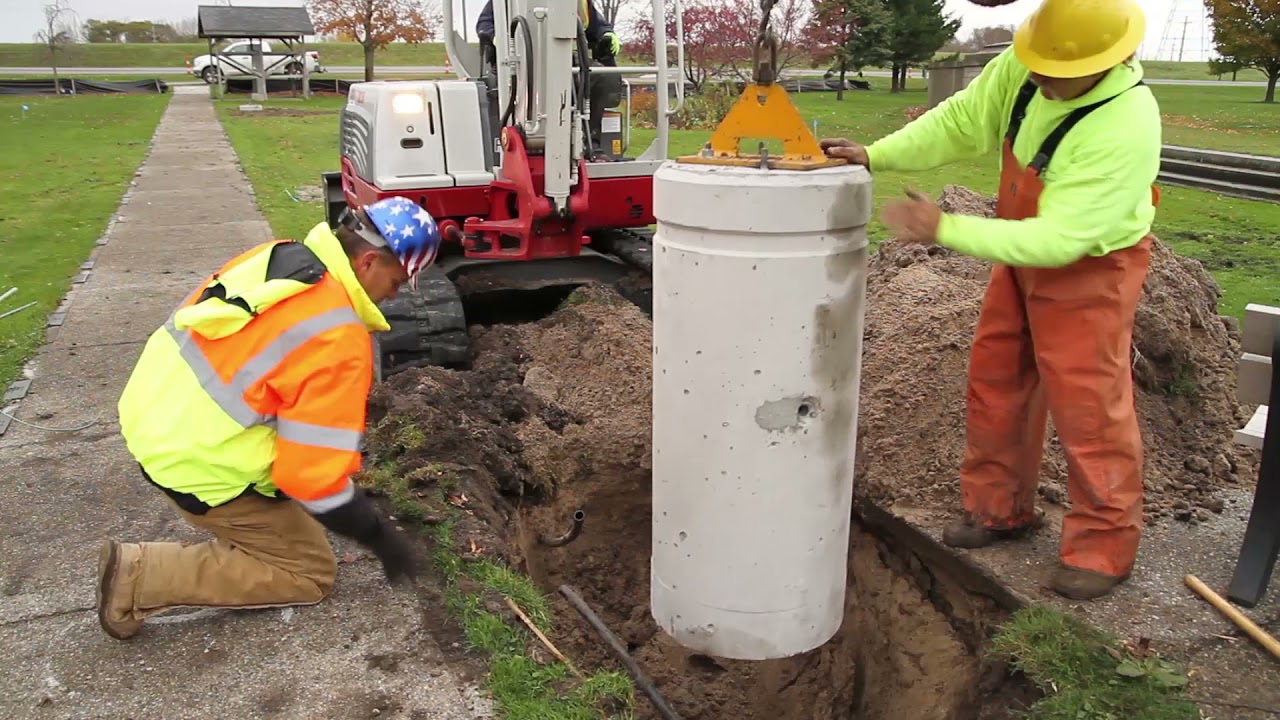 Electrical Contractor Installs 84 Precast Concrete Light Pole Bases In High Water Level Conditions
