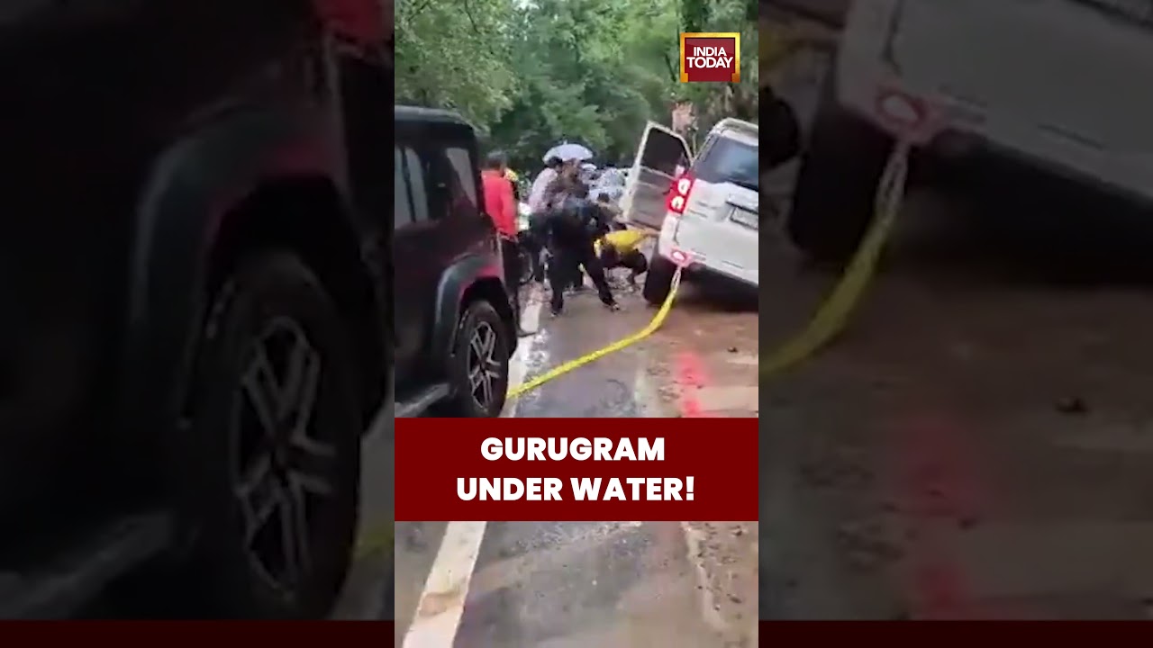 Gurugram Rain: Heavy Rain Wreaks Havoc in Gurugram | Creates Dangerous Pit, Vehicles Stuck #monsoon