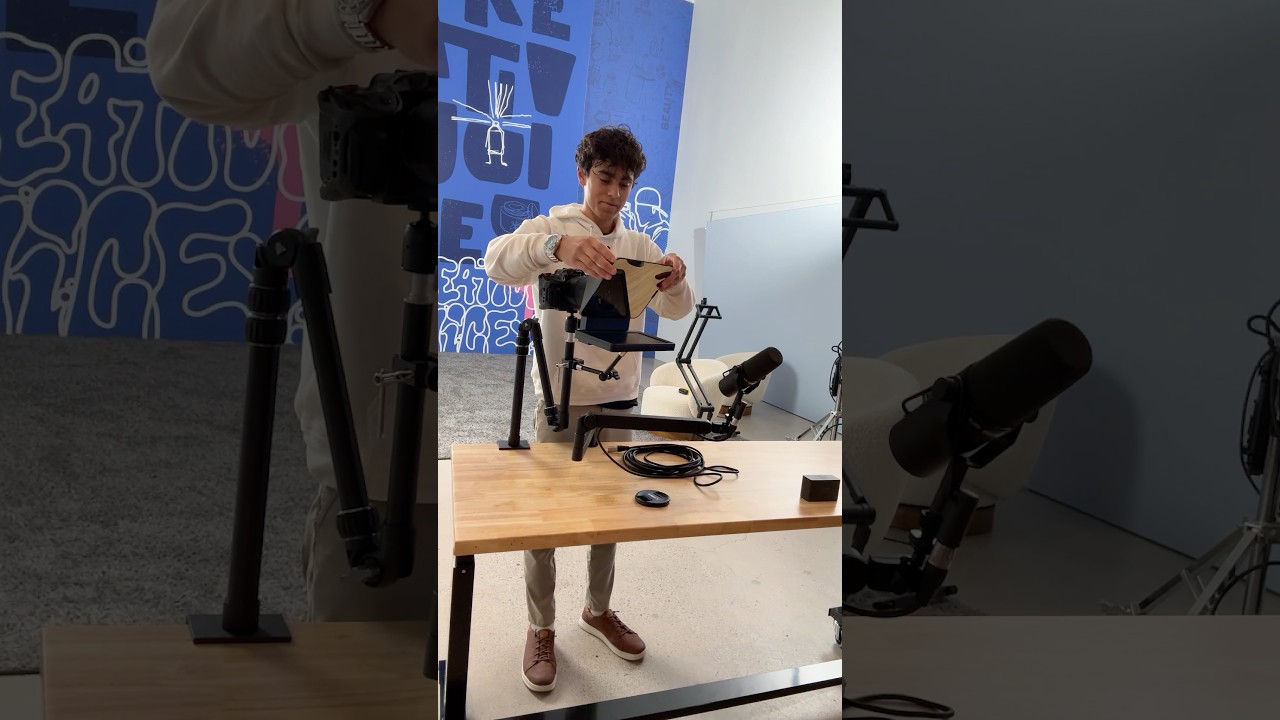 Content creator desk setup. Teleprompter, podcast mic, desk tripod for camera..