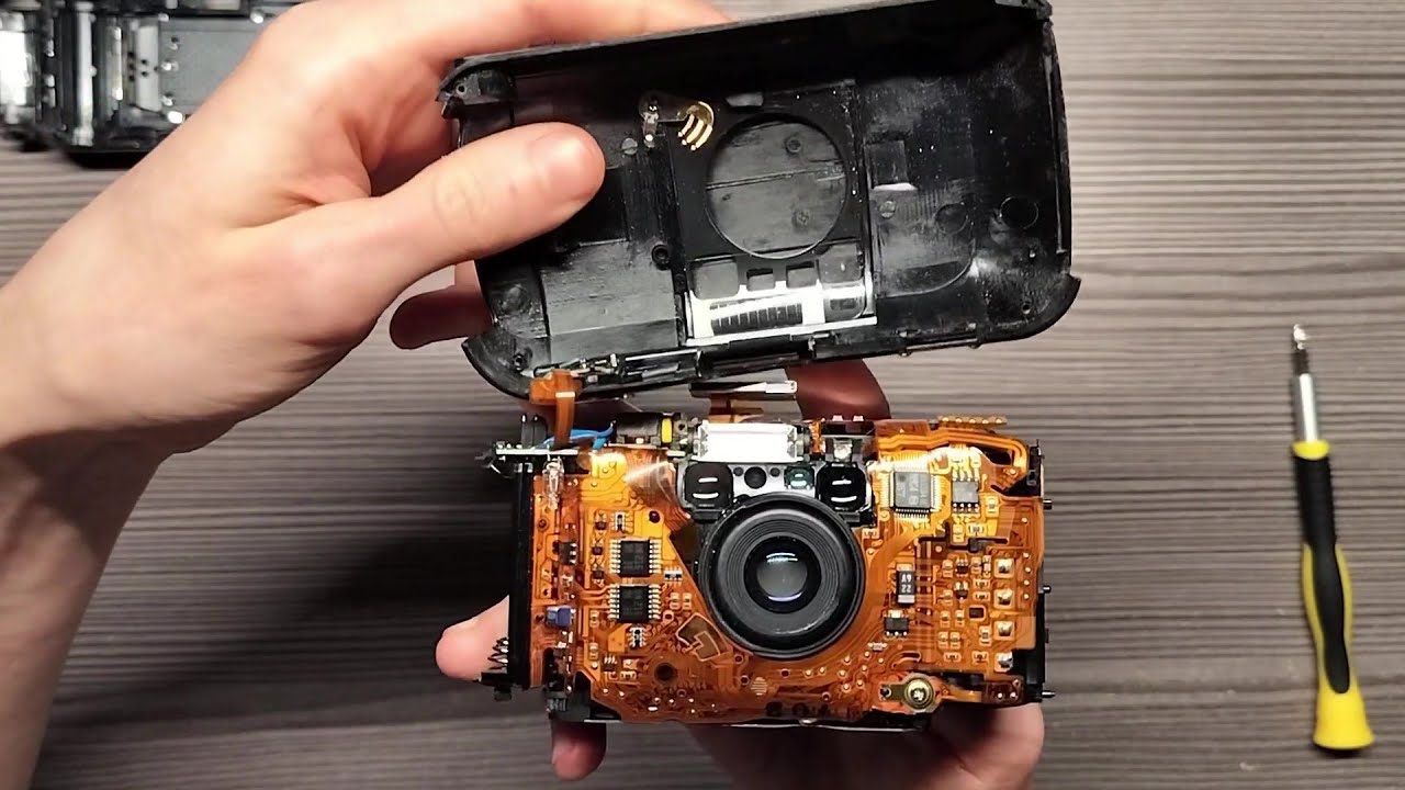 Olympus MJU 1 dis- and reassembly + issues I fixed in description