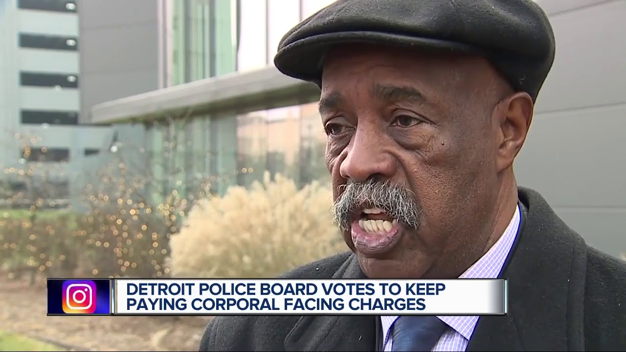 Detroit police board votes to let suspended officer keep pay while charged with assault