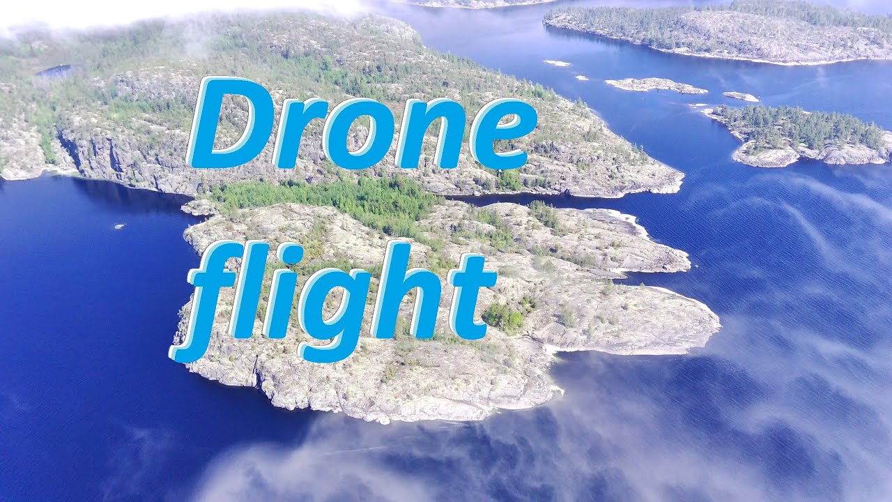 4k drone flight. Lake Ladoga, skerries and islands. Дрон летает между островами Ладоги. FIMI X8 MINI