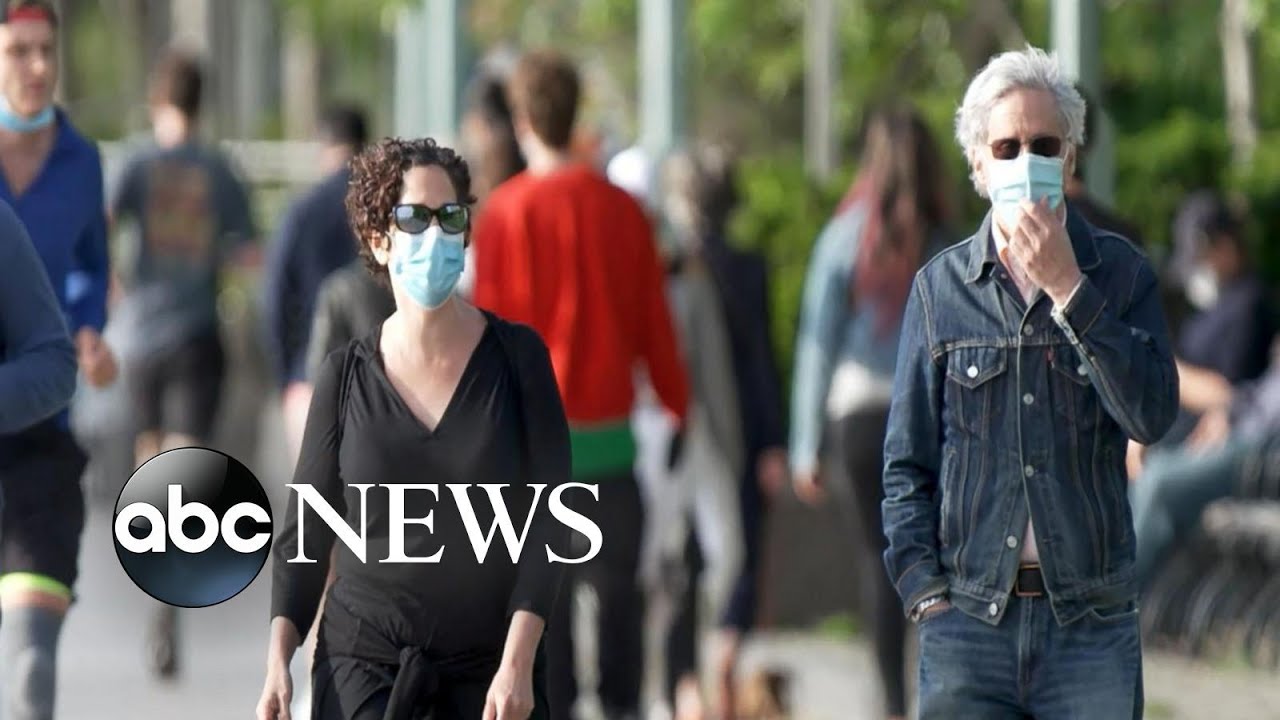 Coronavirus cases surge nationwide as voters cast ballots early