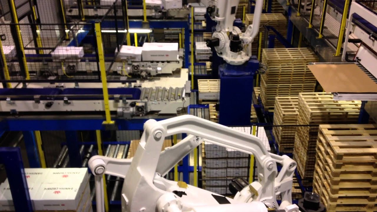 Transportanlæg og palletering af papkasser - Transport system and palletizing for cardboard boxes