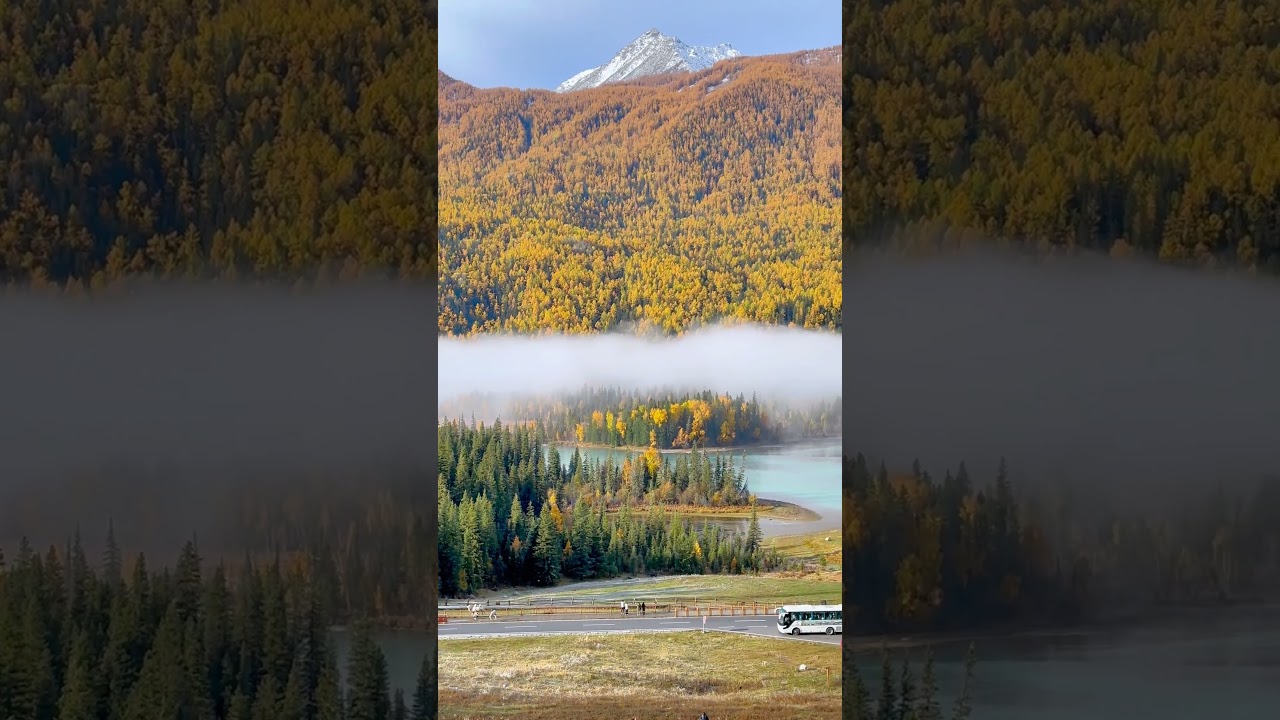 Alpine lake nestles at verdant valleys and snow-dusted mountains #escape #travel#xinjiang  #china