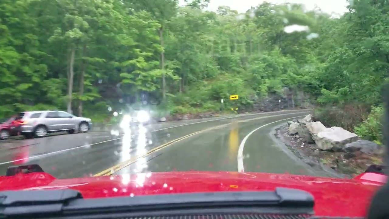 Bronco in the rain!  No doors, no top.